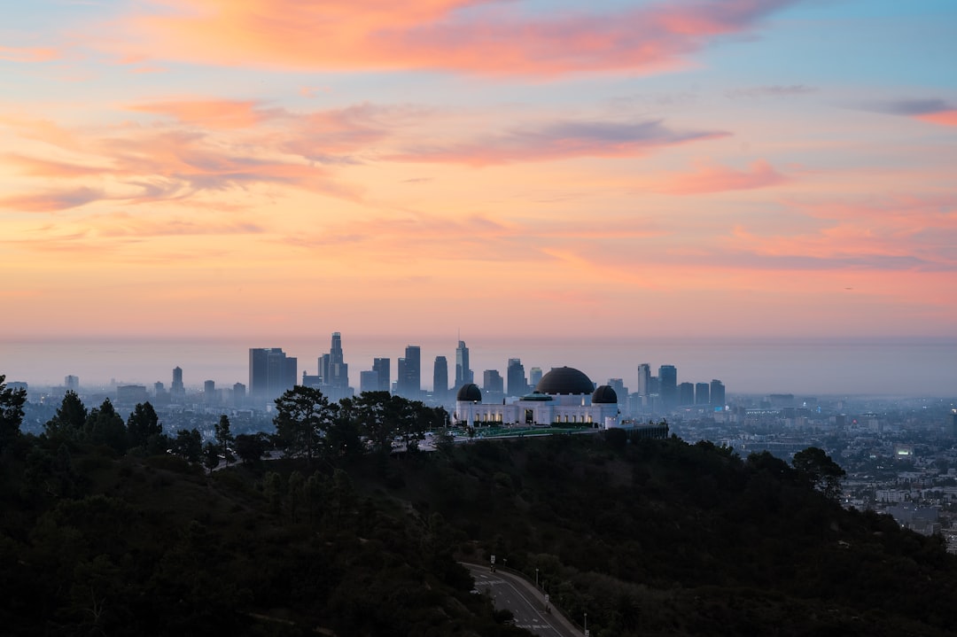 City skyline at sunset with griffith observatory.