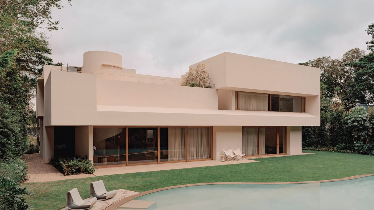 Le Corbusier Inspired This Candy Pink Villa Nestled in Singapore's Jungle
