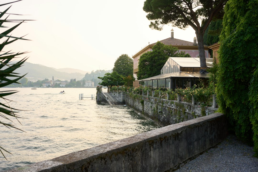 A building and the sea under a hazy sky